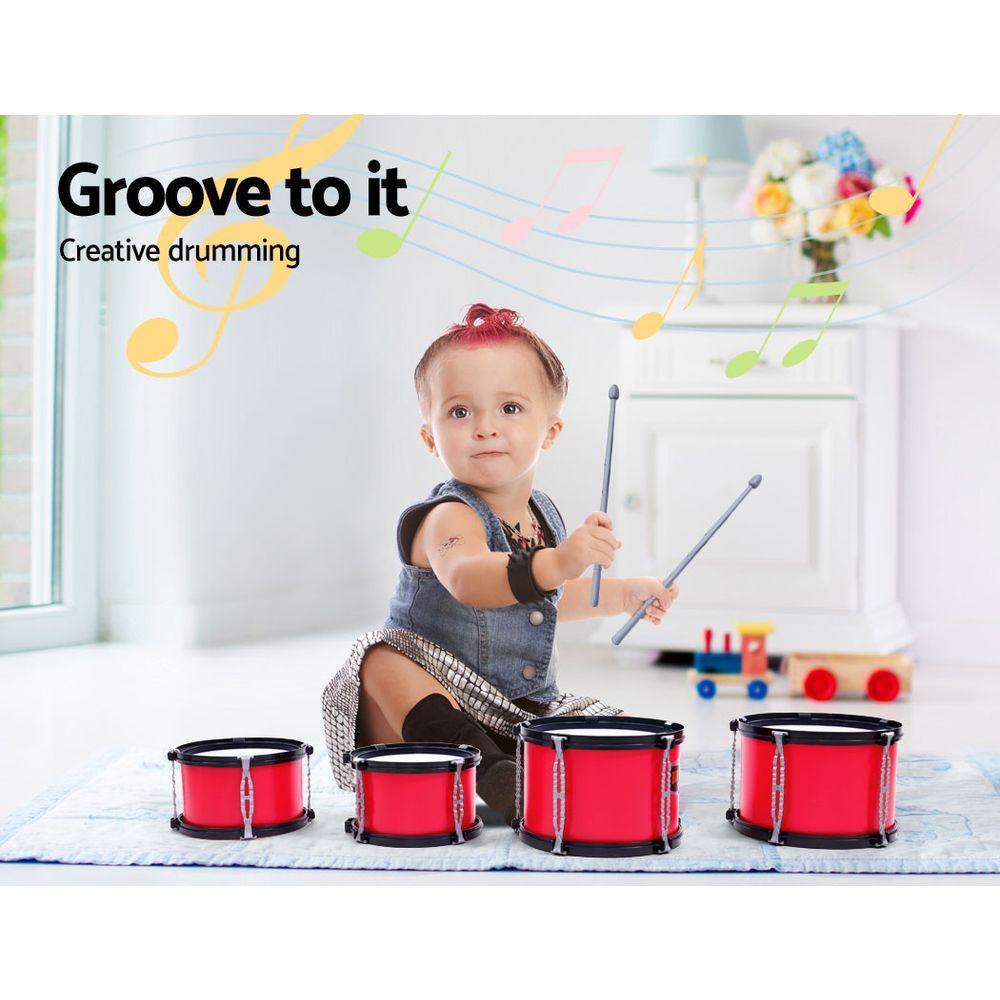 Keezi Kids 7 Drum Set featuring a bass drum, toms, cymbal, and stool in vibrant red color, designed for children aged 3 and above.